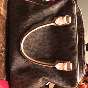 Brown and cream Michael Kors signature handbag